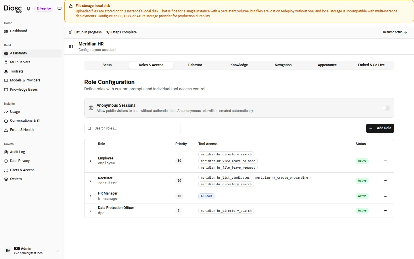 The Roles & Access tab for an HR assistant: four roles (HR Manager, Recruiter, Employee, Data Protection Officer) with their priority, tool access, and status. HR Manager shows "All Tools"; the others show scoped allow-lists.